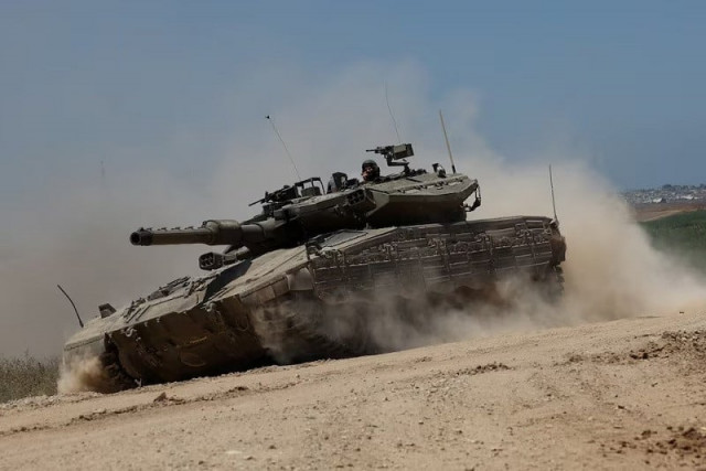 an israeli tank manoeuvres near the israel gaza border in israel may 16 2024 photo reuters an israeli tank manoeuvres near the israel gaza border in israel may 16 2024 photo reuters