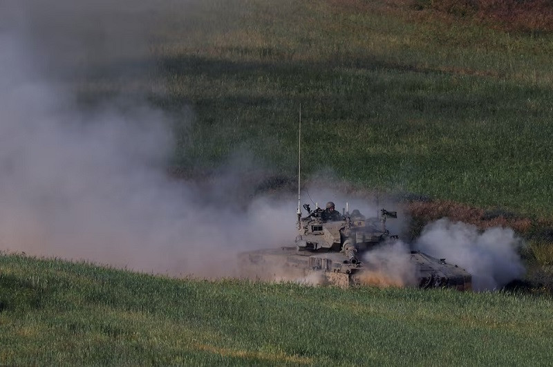 an israeli tank maneuvers near the israel gaza border april 2 2024 photo reuters