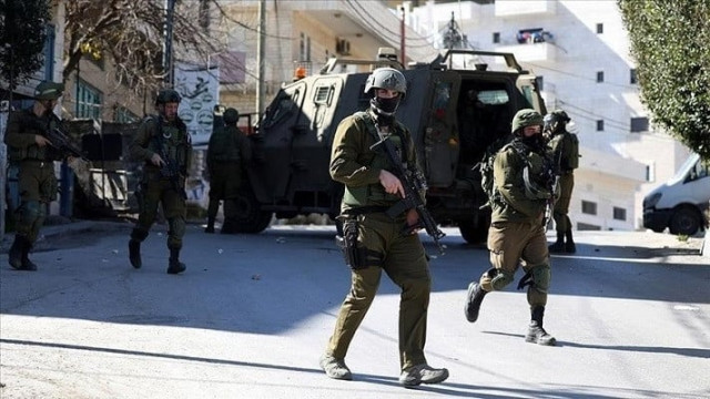 eyewitness says israeli forces were present at the scene and provided protection to the settlers photo anadolu agency eyewitness says israeli forces were present at the scene and provided protection to the settlers photo anadolu agency