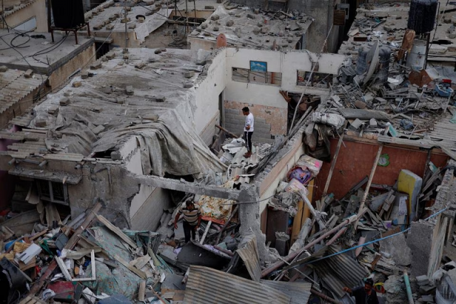 palestinians check the damage at the site of israeli strikes on houses in khan younis in the southern gaza strip october 29 photo reuters palestinians check the damage at the site of israeli strikes on houses in khan younis in the southern gaza strip october 29 photo reuters