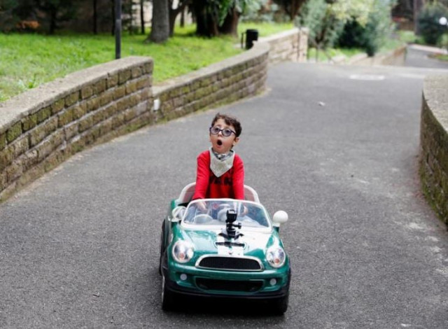 sirio persichetti a 7 year old italian with spastic tetraplegia and cerebral palsy who has become an influencer by challenging perceptions of disability drives his toy car in the frontyard of his home in rome italy october 23 2020 picture taken october 23 2020 reuters sirio persichetti a 7 year old italian with spastic tetraplegia and cerebral palsy who has become an influencer by challenging perceptions of disability drives his toy car in the frontyard of his home in rome italy october 23 2020 picture taken october 23 2020 reuters