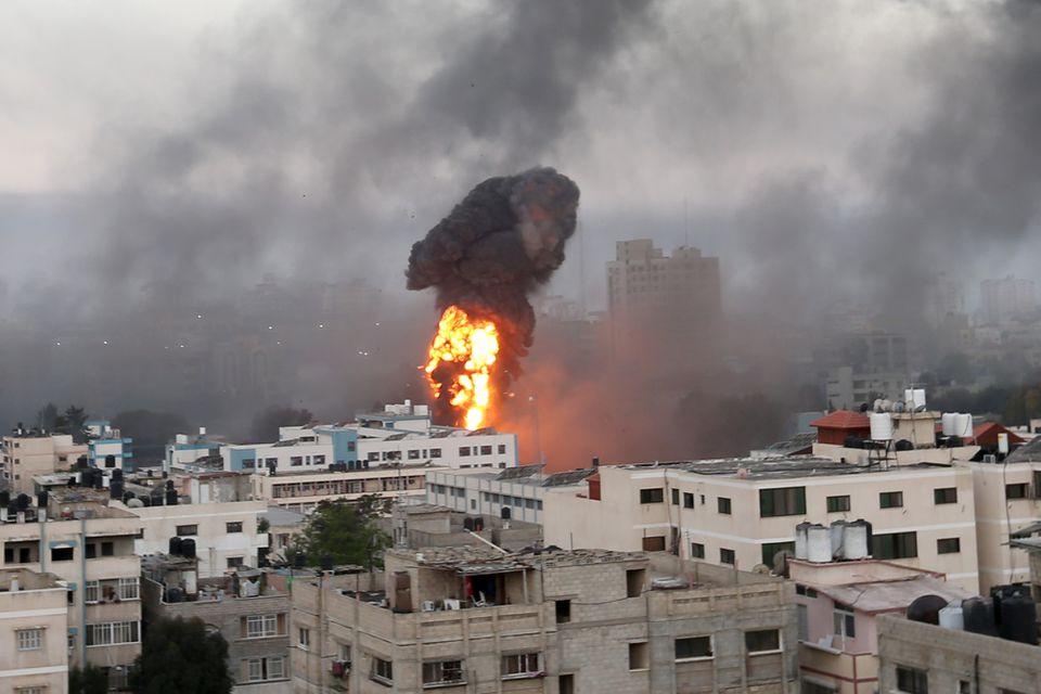 smoke and flames rise during israeli air strikes amid a flare up of israeli palestinian violence in gaza may 12 2021 photo reuters