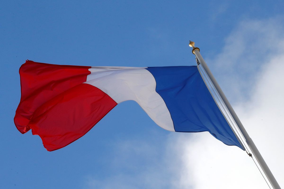 a french flag flutters in the sky over the elysee palace in paris france december 10 2018 photo reuters