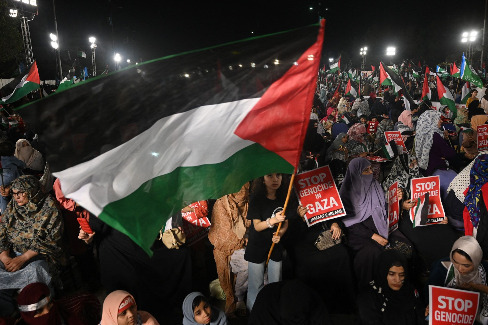 ji supporters wave the palestinian flags as they gather to show solidarity with the palestinian people on march 31 2024 in karachi photo afp