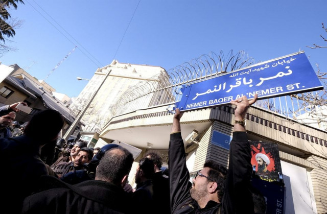 an iranian protester holds up a street sign with the name of shi ite cleric sheikh nimr al nimr during a demonstration against the execution of nimr in saudi arabia outside the saudi arabian embassy in tehran january 3 2016 reuters an iranian protester holds up a street sign with the name of shi ite cleric sheikh nimr al nimr during a demonstration against the execution of nimr in saudi arabia outside the saudi arabian embassy in tehran january 3 2016 reuters
