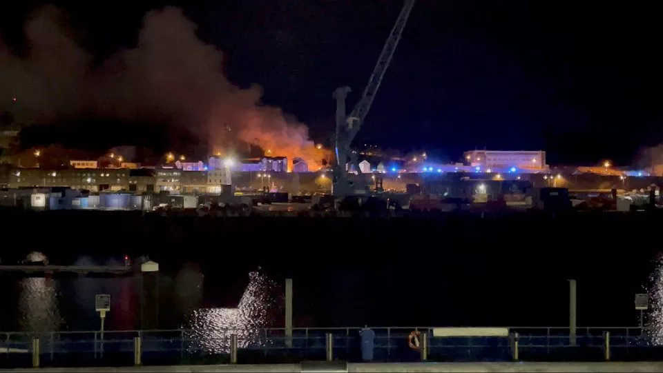 a general view of fire and smoke in saint helier following an explosion on the island of jersey channel islands december 10 2022 in this still image obtained from a social media video daniel hunt via reuters a general view of fire and smoke in saint helier following an explosion on the island of jersey channel islands december 10 2022 in this still image obtained from a social media video daniel hunt via reuters