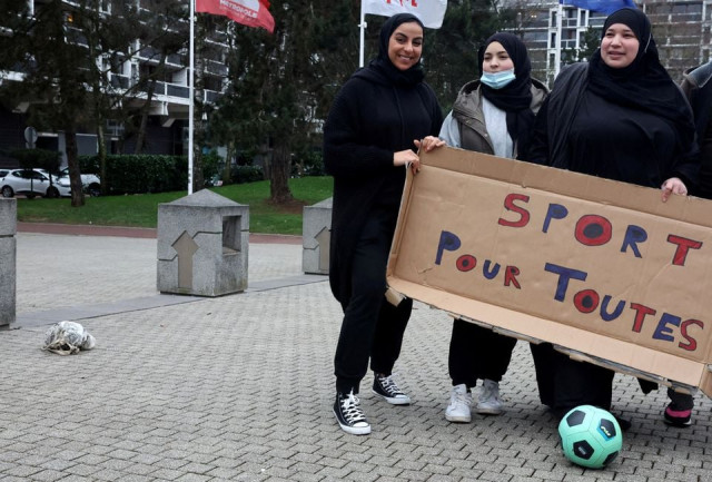 supporters of the women soccer team les hijabeuses gather in front of the city hall in lille as part of a protest as french senate examines a bill featuring controversial hijab ban in competitive sports in france february 16 2022 the slogan reads sport for all photo reuters supporters of the women soccer team les hijabeuses gather in front of the city hall in lille as part of a protest as french senate examines a bill featuring controversial hijab ban in competitive sports in france february 16 2022 the slogan reads sport for all photo reuters