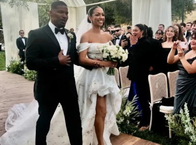 jamie foxx beams as he walks daughter corinne down the aisle at intimate wedding jamie foxx beams as he walks daughter corinne down the aisle at intimate wedding