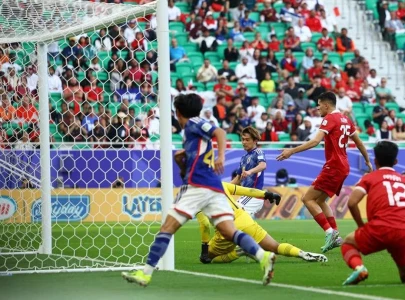 japan into asian cup last 16 as iraq win five goal thriller japan into asian cup last 16 as iraq win five goal thriller