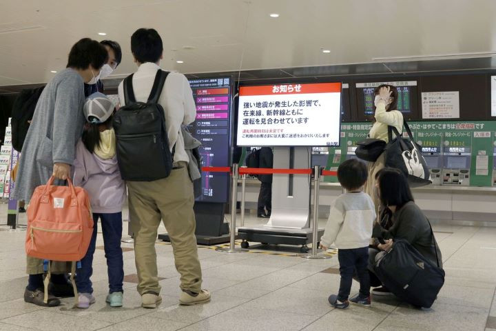 people gather around a ticket gate as train services are suspended following an earthquake in sendai miyagi prefecture japan in this photo taken by kyodo on may 1 2021 mandatory credit kyodo via reuters