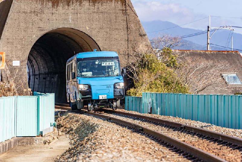 a dual mode vehicle dmv bus that can run both on conventional road surfaces and a railway track is seen during its test run in kaiyo town tokushima prefectue japan photo reuters