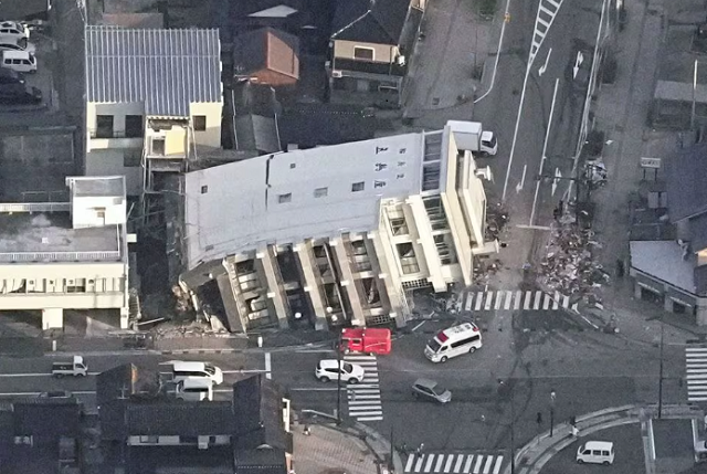 photo an aerial view shows a collapsed building caused by an earthquake in wajima ishikawa prefecture japan january 2 2024 in this photo released by kyodo reuters