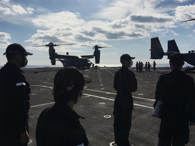 japan maritime self defense force soldiers watch us mv 22 osprey aircrafts on board of the helicopter destroyer js kaga during keen sword amid the coronavirus disease covid 19 outbreak at mid sea off south of japan october 26 2020 photo reuters