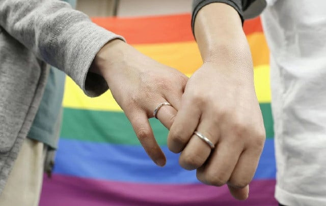 plaintiffs hold hands each other after a district court ruled on the legality of same sex marriages outside sapporo district court in sapporo hokkaido northern japan march 17 2021 in this photo taken by kyodo photo reuters plaintiffs hold hands each other after a district court ruled on the legality of same sex marriages outside sapporo district court in sapporo hokkaido northern japan march 17 2021 in this photo taken by kyodo photo reuters