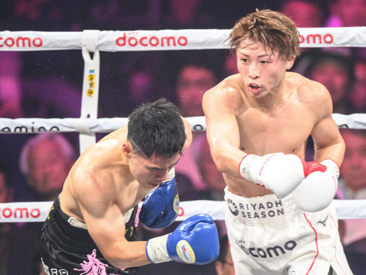 japan s unbeaten naoya inoue knocking out a goading kim ye joon to retain his undisputed world super bantamweight titles in tokyo on friday photo afp