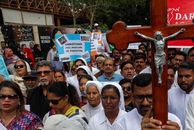 members of the christian community chant slogans as they gather to condemn the attacks on churches and houses in jaranwala town of faisalabad during a protest in karachi pakistan august 18 2023 photo reuters