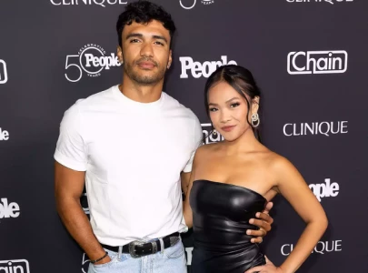 the bachelorette jenn tran and jonathon johnson spark dating rumours at people s 50th birthday party