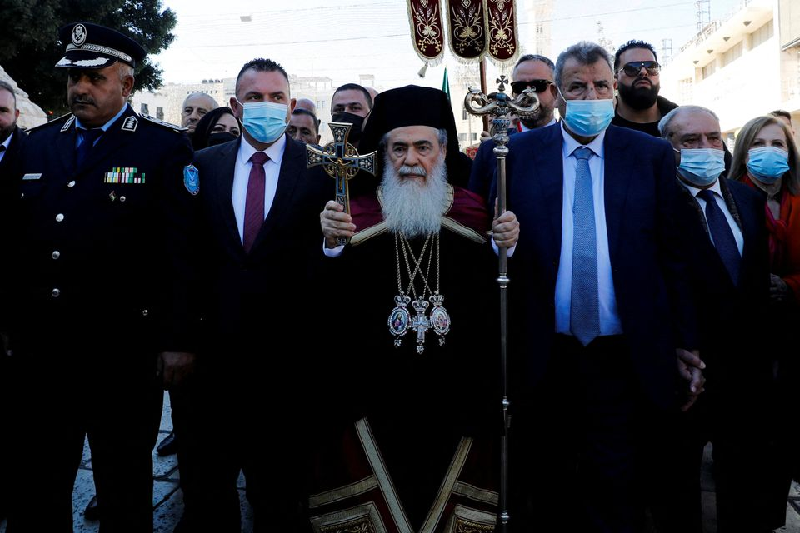 greek orthodox patriarch of jerusalem theophilos iii arrives at the church of the nativity to celebrate christmas according to the eastern orthodox calendar in bethlehem in the israeli occupied west bank january 6 2022 photo reuters