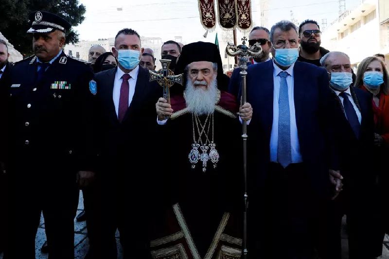greek orthodox patriarch of jerusalem theophilos iii arrives at the church of the nativity to celebrate christmas according to the eastern orthodox calendar in bethlehem in the israeli occupied west bank january 6 2022 photo reuters greek orthodox patriarch of jerusalem theophilos iii arrives at the church of the nativity to celebrate christmas according to the eastern orthodox calendar in bethlehem in the israeli occupied west bank january 6 2022 photo reuters