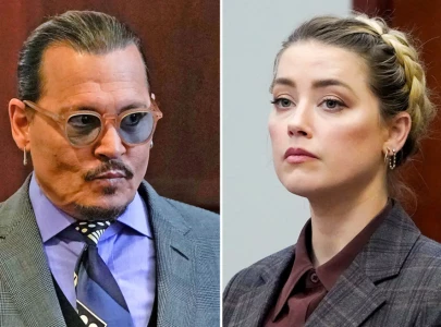 amber heard settles lawsuit with johnny depp agrees to pay 1million