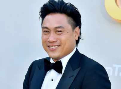 director jon m chu misses wicked premiere for birth of fifth child