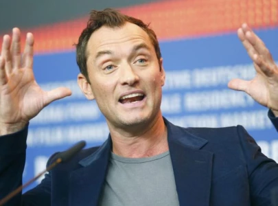 jude law receives standing ovation at venice film festival for role in the order