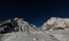 the world s second largest mountain the 8 611 meter high k2 seen in the distance and the 8 051 meter high broad peak r are illuminated by the moon at concordia the confluence of the baltoro and godwin austen glaciers in the karakoram mountain range in pakistan photo reuters
