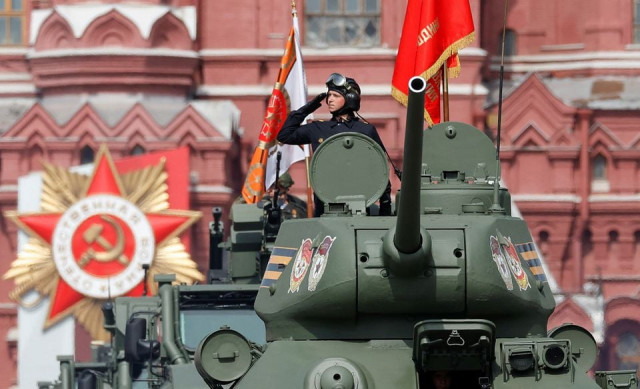 a russian service member is seen atop of a t 34 soviet era tank during a rehearsal for a military parade marking the anniversary of the victory over nazi germany in world war two in red square in central moscow russia may 7 2022 photo reuters a russian service member is seen atop of a t 34 soviet era tank during a rehearsal for a military parade marking the anniversary of the victory over nazi germany in world war two in red square in central moscow russia may 7 2022 photo reuters