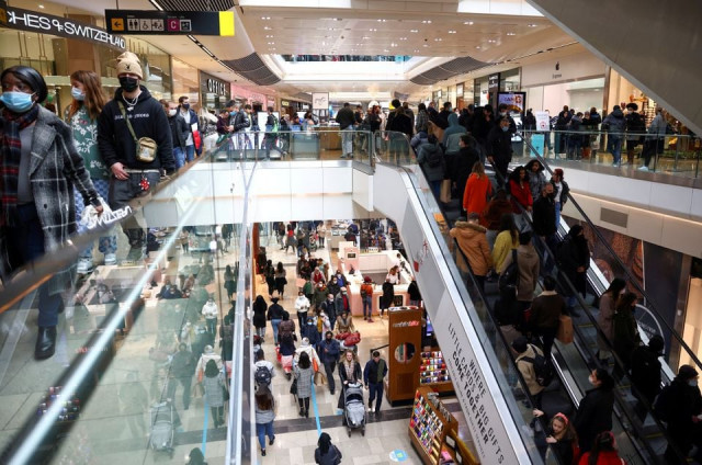 people walk through the westfield stratford city shopping centre amid the coronavirus disease covid 19 outbreak in london britain december 5 2020 photo reuters people walk through the westfield stratford city shopping centre amid the coronavirus disease covid 19 outbreak in london britain december 5 2020 photo reuters