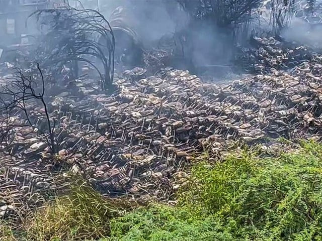 photograph shows motorcycles burnt at a parking lot in karachi s gulshan e iqbal on june 12 2022 photo courtesy social media photograph shows motorcycles burnt at a parking lot in karachi s gulshan e iqbal on june 12 2022 photo courtesy social media