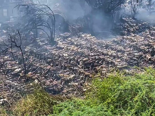 photograph shows motorcycles burnt at a parking lot in karachi s gulshan e iqbal on june 12 2022 photo courtesy social media