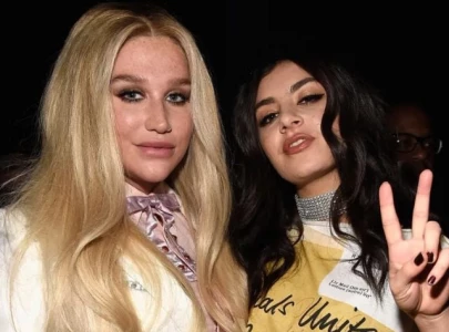kesha joins charli xcx on stage and drop remix of spring breakers on charli s remix album
