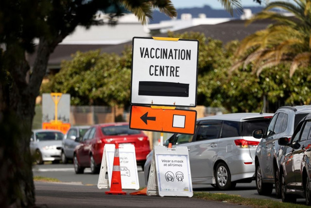 a vaccination centre sign directs the public during a lockdown to curb the spread of a coronavirus disease covid 19 outbreak in auckland new zealand august 26 2021 photo reuters