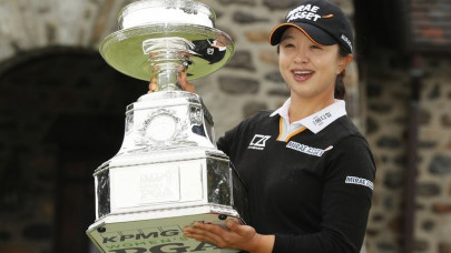 kim claims maiden major title