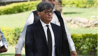 attorney general for pakistan khalid jawed khan arrives to attend a hearing outside the supreme court building in islamabad on april 7 2022 photo afp