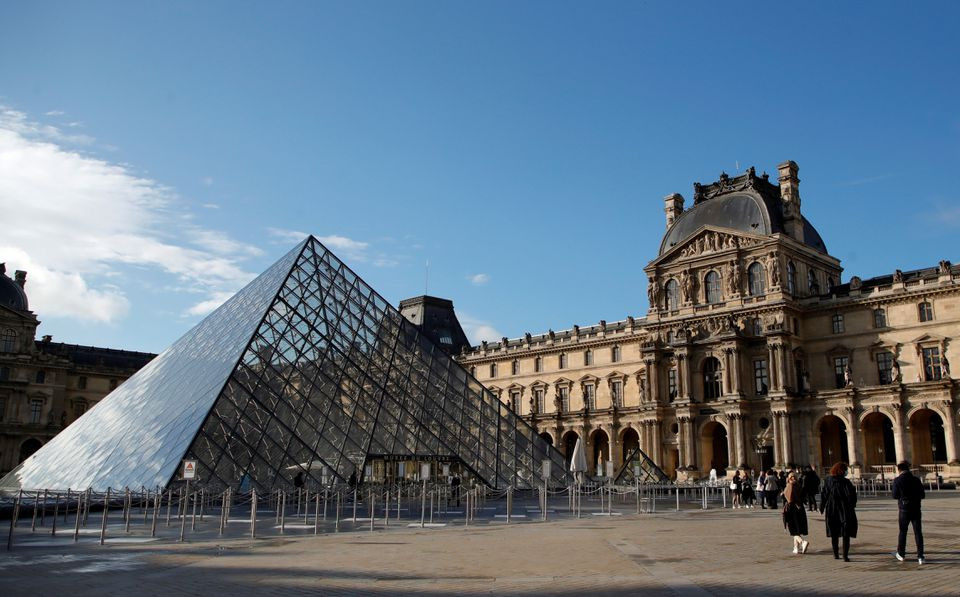 the louvre pyramid designed by chinese born us architect ieoh ming pei in paris as the louvre museum reopens its doors to the public after more than 6 months of closure due to the coronavirus disease covid 19 outbreak in france may 19 2021 photo reuters