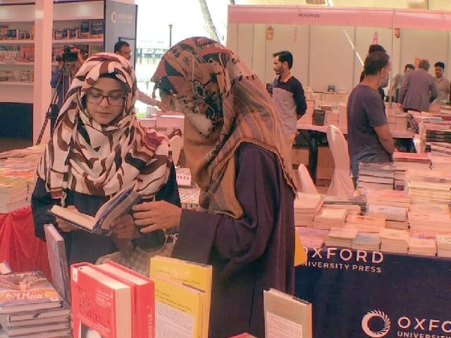 visitors browse through books at exhibit on the concluding day of the 14th karachi literature festival photos express visitors browse through books at exhibit on the concluding day of the 14th karachi literature festival photos express