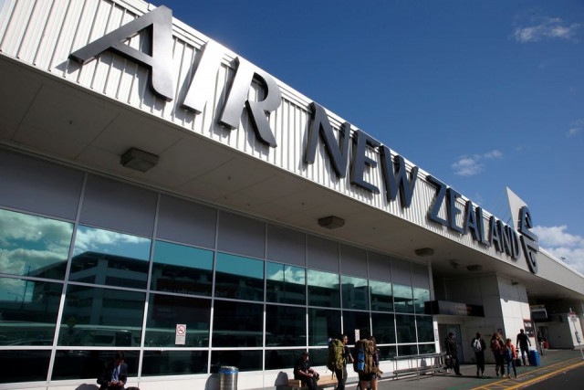 travellers walk under an air new zealand sign at auckland airport in new zealand september 20 2017 photo reuters travellers walk under an air new zealand sign at auckland airport in new zealand september 20 2017 photo reuters