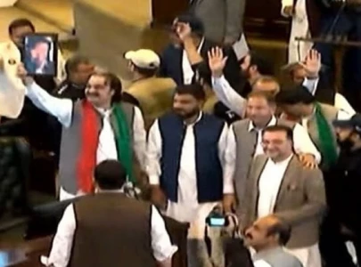 k p assembly sworn in amid chaos