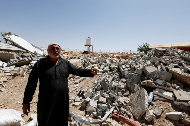 palestinian mahmoud najajreh points at his demolished house in masafer yatta south of hebron in the israeli occupied west bank may 31 2022 picture taken may 31 2022 reuters palestinian mahmoud najajreh points at his demolished house in masafer yatta south of hebron in the israeli occupied west bank may 31 2022 picture taken may 31 2022 reuters