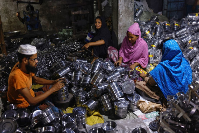 workers package tiffin carriers inside a factory in dhaka bangladesh august 2 2022 reuters workers package tiffin carriers inside a factory in dhaka bangladesh august 2 2022 reuters