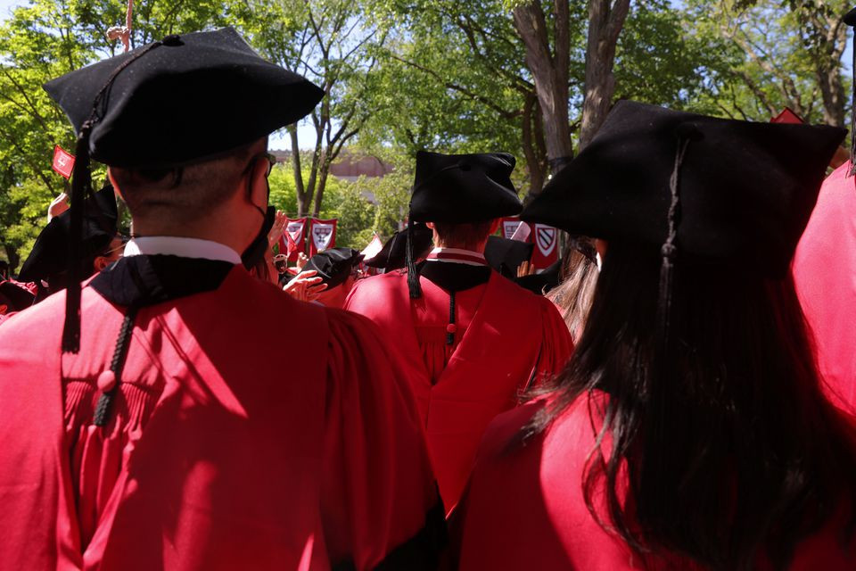 file photo   graduating students stand during harvard university s 371st commencement exercises in cambridge massachusetts u s may 26 2022 reuters