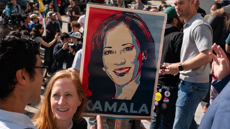 a supporter holds a sign as members of the san francisco democratic party gather to support kamala harris july 22 2024 photo afp