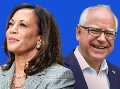 kamala harris and tim walz wear coordinated blue suits as they kick off campaign in philadelphia
