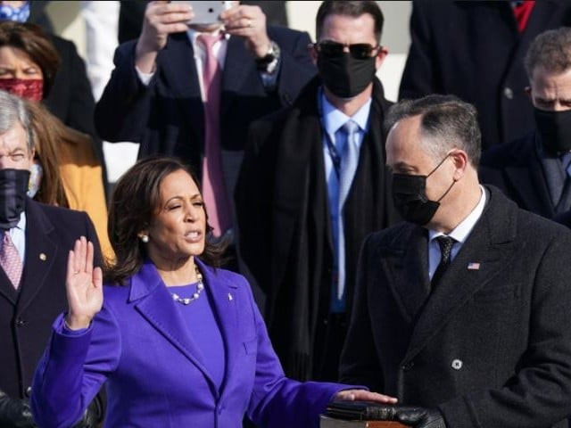 kamala harris is sworn in as us vice president as her spouse doug emhoff holds a bible during the inauguration of joe biden as the 46th president of the united states on the west front of the us capitol in washington us january 20 2021 photo reuters
