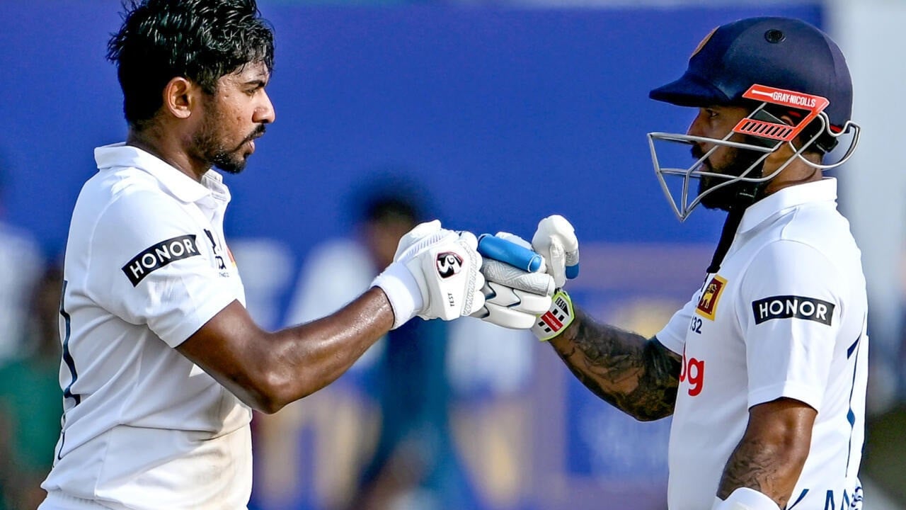 sri lanka s kamindu mendis l celebrates with kusal mendis after scoring a century on the first day of the first test against new zealand on september 18 2024 photo afp