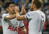 emotional harry kane right will play against former strike partner son heung min left in seoul in august photo afp
