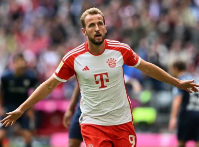 we ll never give up says kane after bayern beat leipzig