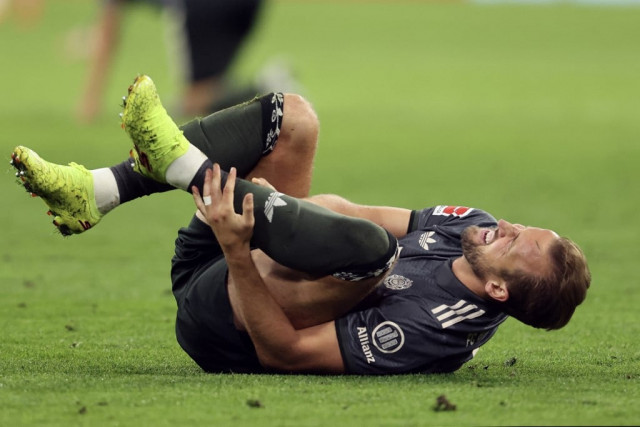 kane limps off as bayern held by leverkusen kane limps off as bayern held by leverkusen