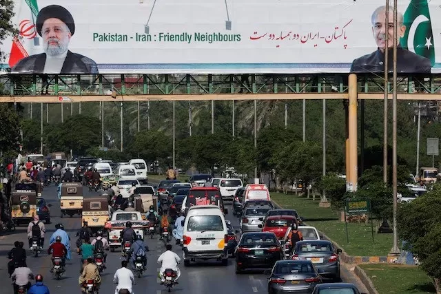 billboard displaying the photos of prime minister shehbaz and iranian president raisi in karachi pakistan april 22 2024 photo reuters billboard displaying the photos of prime minister shehbaz and iranian president raisi in karachi pakistan april 22 2024 photo reuters